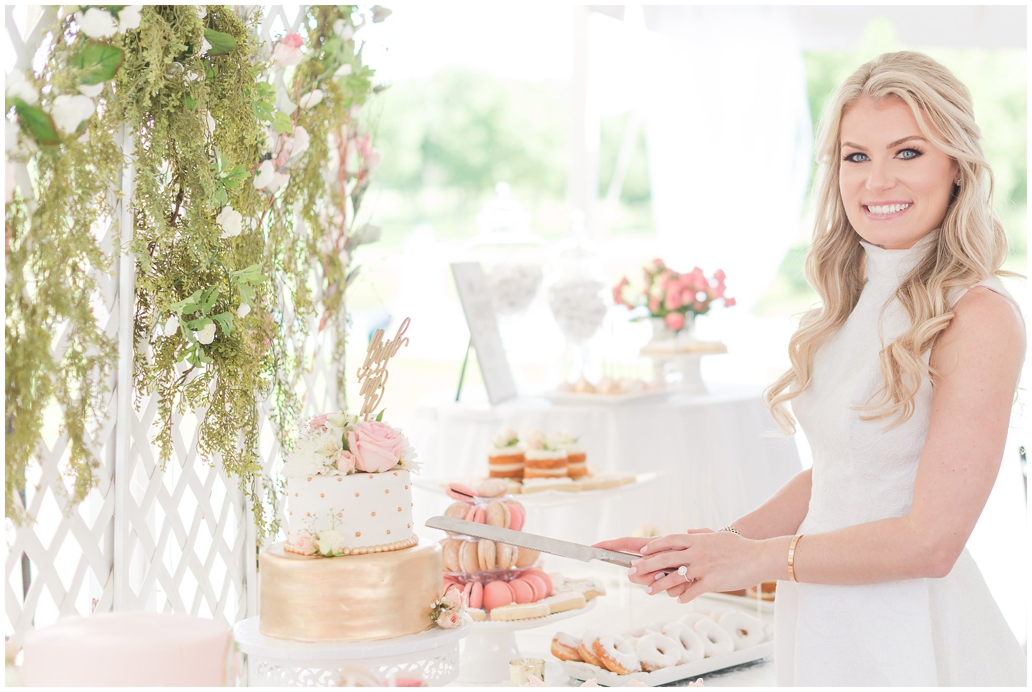 bride cuts bridal shower cake