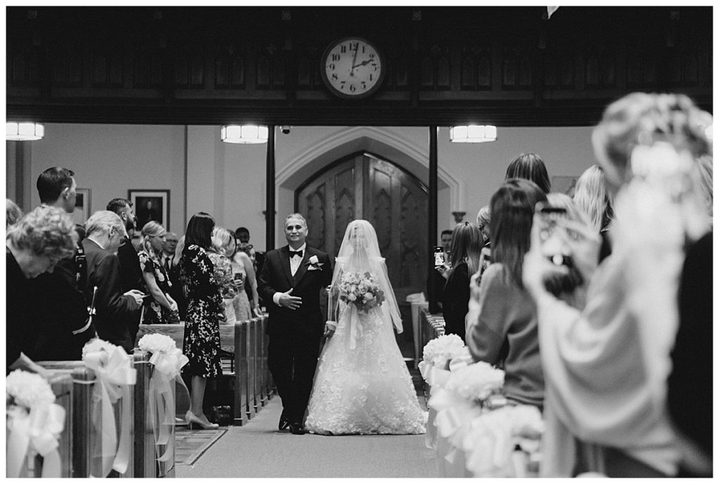 father walking ride down the aisle