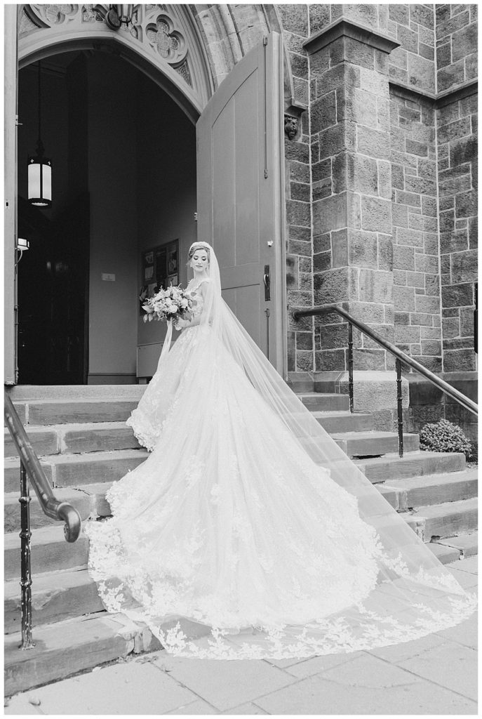 bride on stairs of church