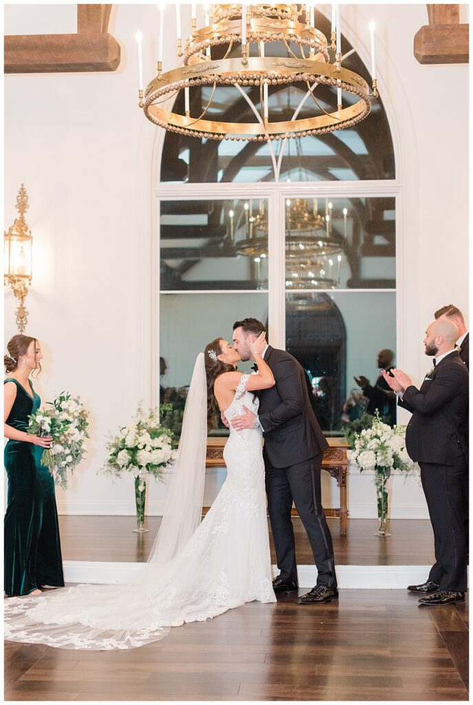 bride and groom kiss