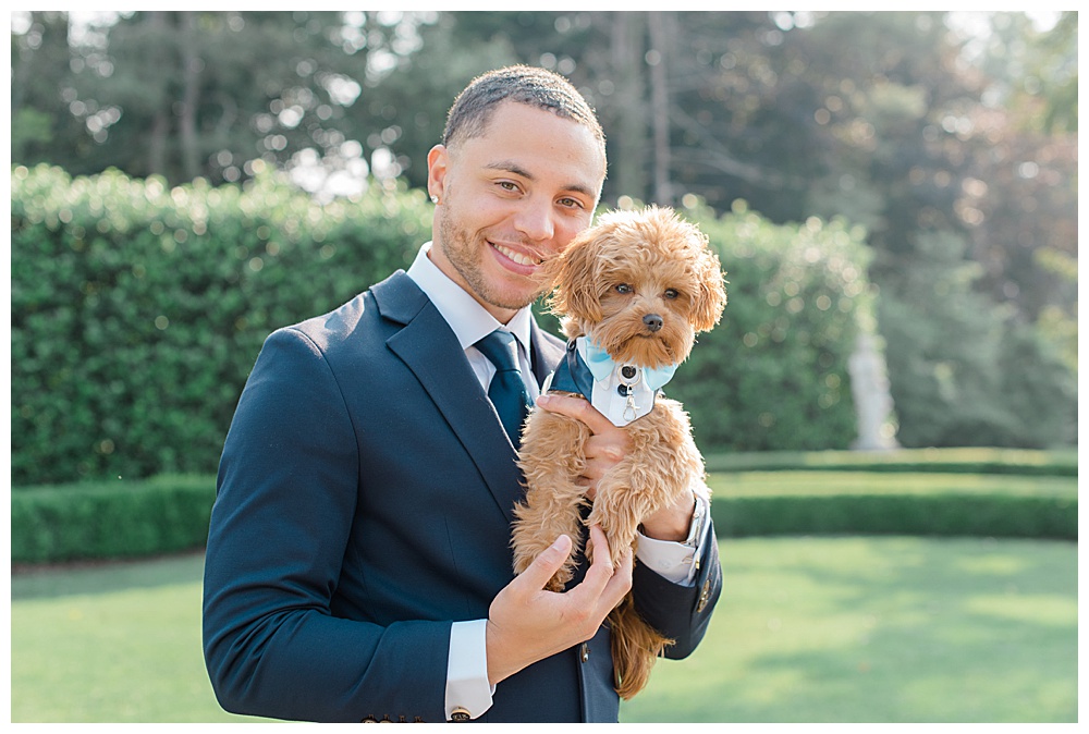 dog with groom on wedding day