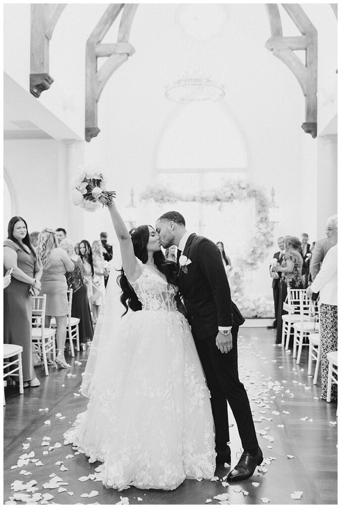 bride and groom kiss