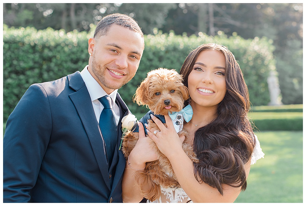 bride and groom with dog